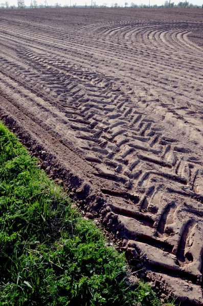農業分野トラック ホイール マーク地面を平準化 — ストック写真