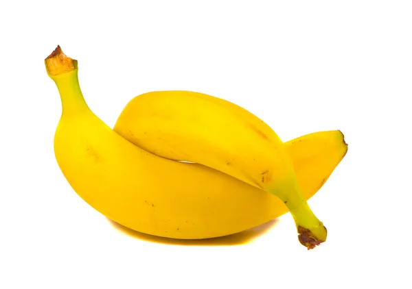 Pareja entrelazada de dos plátanos amarillos aislados — Foto de Stock