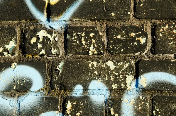 Background closeup of graffitti painted brick wall — Stock Photo, Image