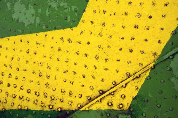 Verde amarelo pintura metal piso closeup fundo — Fotografia de Stock