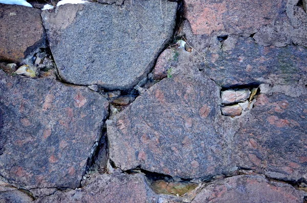 Gamla grunge väggar av polerad sten bakgrund — Stockfoto