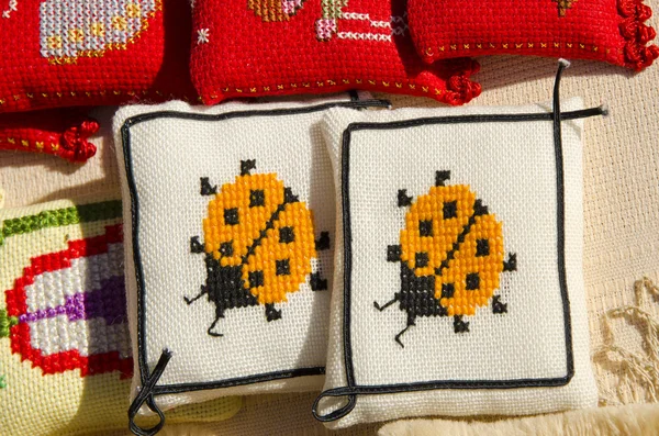 Handmade sewing pillows ladybird sold fair market — Stock Photo, Image