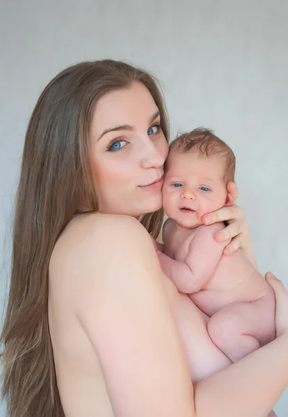 stock image Picture of happy young mother with newborn baby