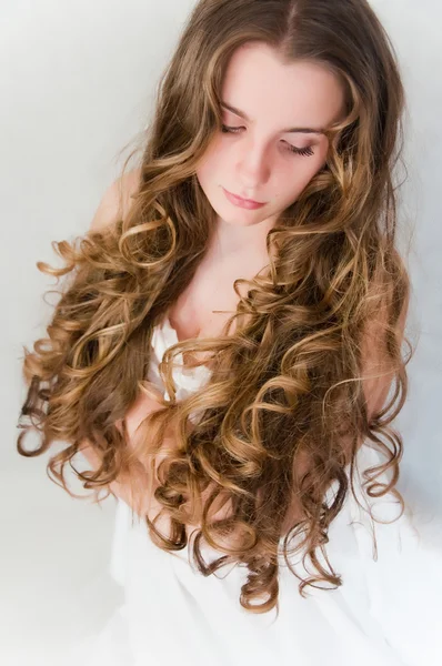 stock image Young girl with beautiful curls