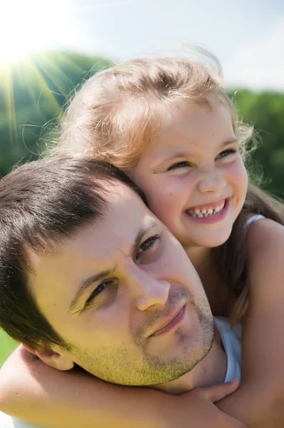 Father and daughter on the meadow — Stock Photo, Image