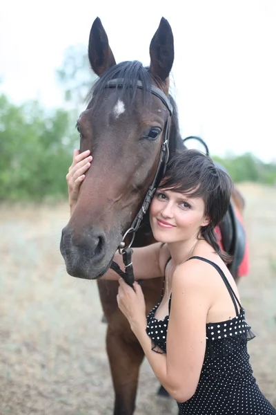 La ragazza e il cavallo Foto Stock
