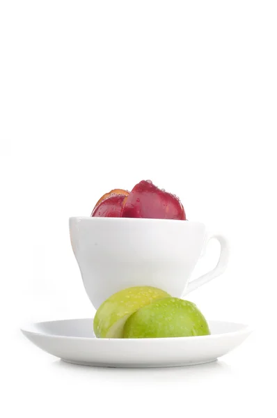 Cup of fresh juice with slice of apple inside — Stock Photo, Image