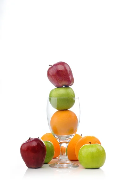 Mix of juicy fruits in glass — Stock Photo, Image