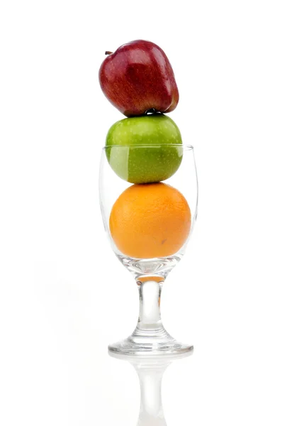 Mix of juicy fruits in wine glass — Stock Photo, Image