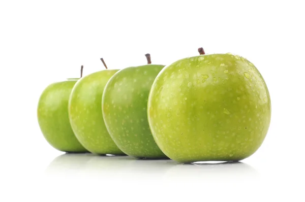 A row of juicy green apple — Stock Photo, Image