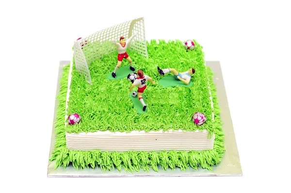 Gâteau de football avec joueur miniature — Photo