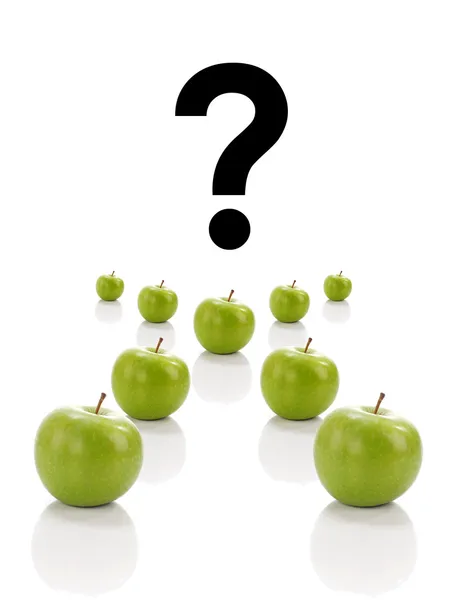 Welche oder wer Konzept mit dem gleichen grünen Apfel in Kreuzposition lizenzfreie Stockfotos