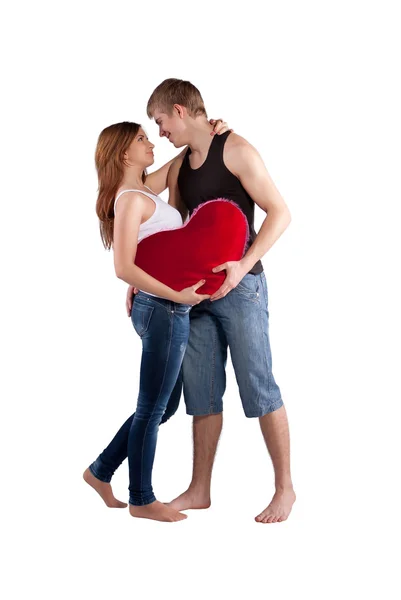 Couple hugging with a red heart — Stock Photo, Image
