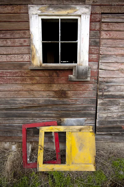 Side of an old bulding and frames. — Stock Photo, Image