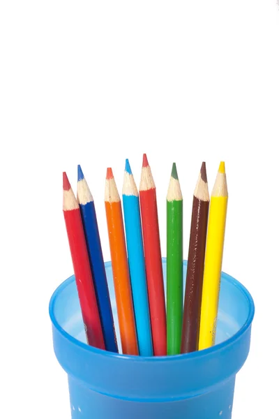 Color pencils spread out in cup. — Stock Photo, Image