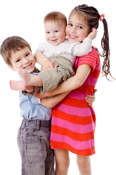 Drie lachende kinderen samen Rechtenvrije Stockfoto's