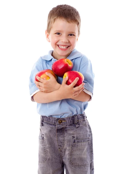 Garçon heureux avec des pommes rouges — Photo