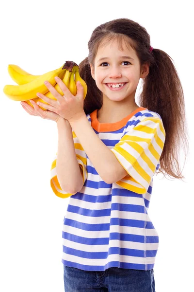 Menina feliz segura um monte de bananas — Fotografia de Stock