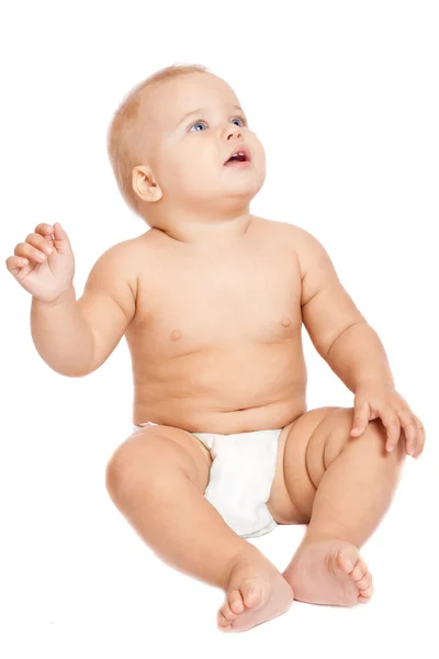 Sonriente bebé sentado en el suelo —  Fotos de Stock