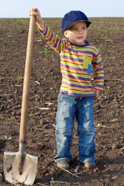 Little children with big shovel clipart