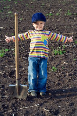 Little children with big shovel clipart