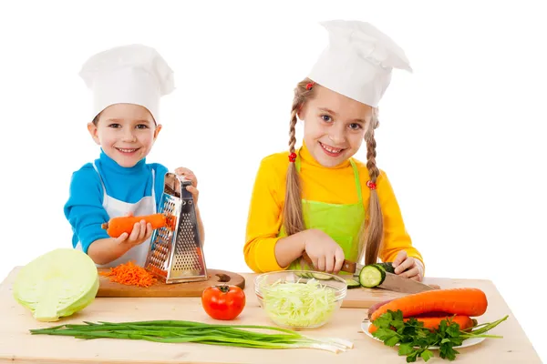 Two kids making salad — Stock Photo, Image