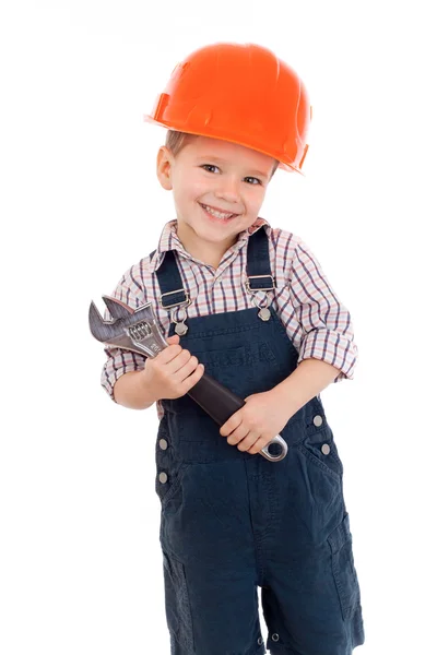 Kleiner Bauarbeiter im Helm mit Schraubenschlüssel — Stockfoto
