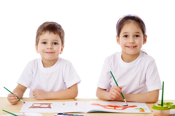 Two little kids draw with watercolor — Stock Photo, Image