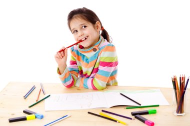 Inspired little girl draw with crayons clipart