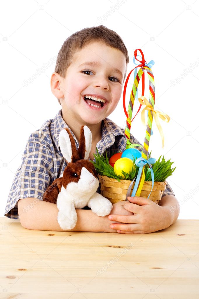 Smiling boy with easter eggs and bunny Stock Photo by ©sbworld7 9054400