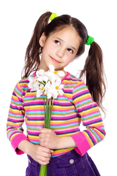 Fundersam tjej med vita påskliljor — Stockfoto