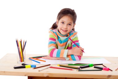 Inspired girl draw with crayons clipart
