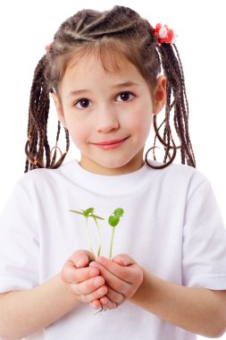 Girl with sprouts in hands clipart