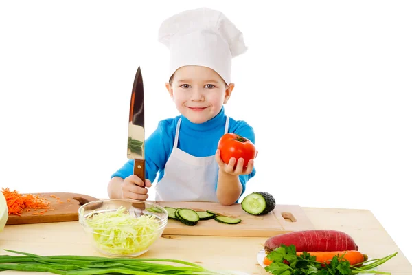 Kleiner Koch mit Messer und Tomaten — Stockfoto