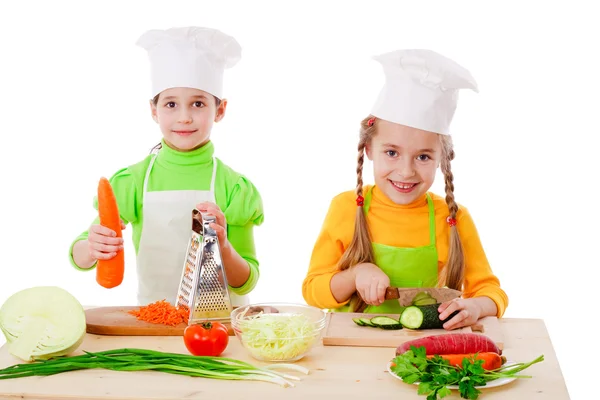 Two girls make a salad — Stock Photo, Image