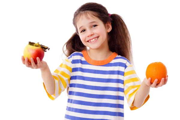 Menina com maçã e laranja — Fotografia de Stock