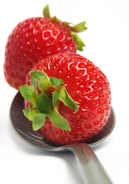 Strawberry on spoon — Stock Photo, Image