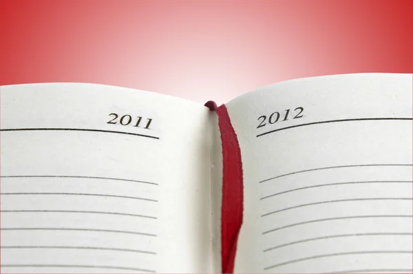 Tagebuch auf rot — Stockfoto