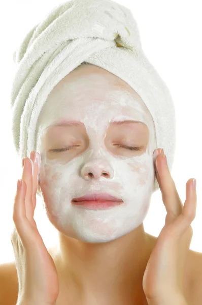 Woman with facial mask Stock Picture