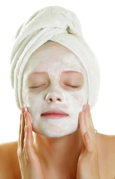 Woman with facial mask Stock Image