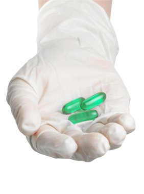 Hand with gloves and pills clipart