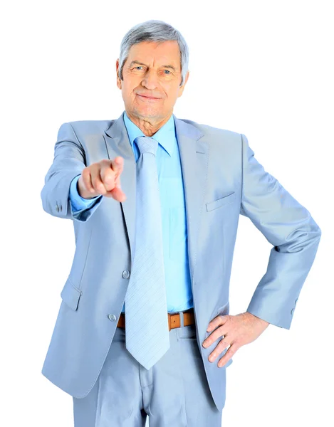 Nice businessman at the age, point the finger. Isolated on a white background. — Stock Photo, Image
