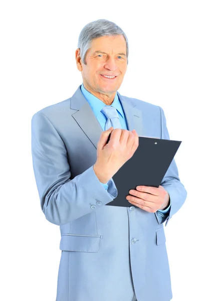 Netter Geschäftsmann im Alter, der den Arbeitsplan studiert. isoliert auf weißem Hintergrund. — Stockfoto