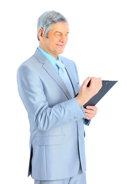 Trevlig affärsman på åldern, studera arbetsplanen. isolerad på en vit bakgrund. — Stockfoto