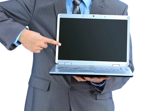 De jonge zakenman houdt de laptop. geïsoleerd op een witte achtergrond. — Stockfoto