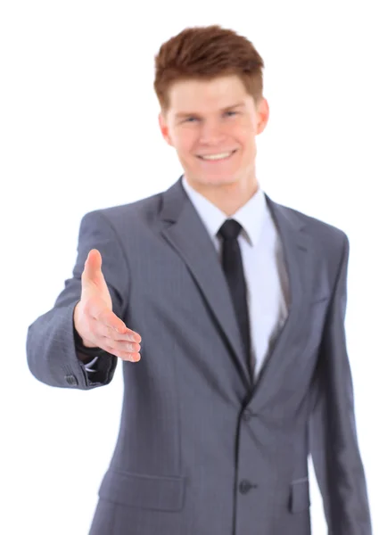 Confident business man giving you a hand shake on white backgrou — Stock Photo, Image