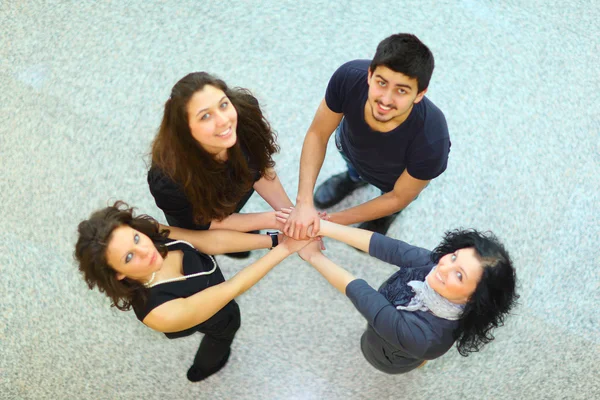Group of with hands together showing teamwork — Stock Photo, Image