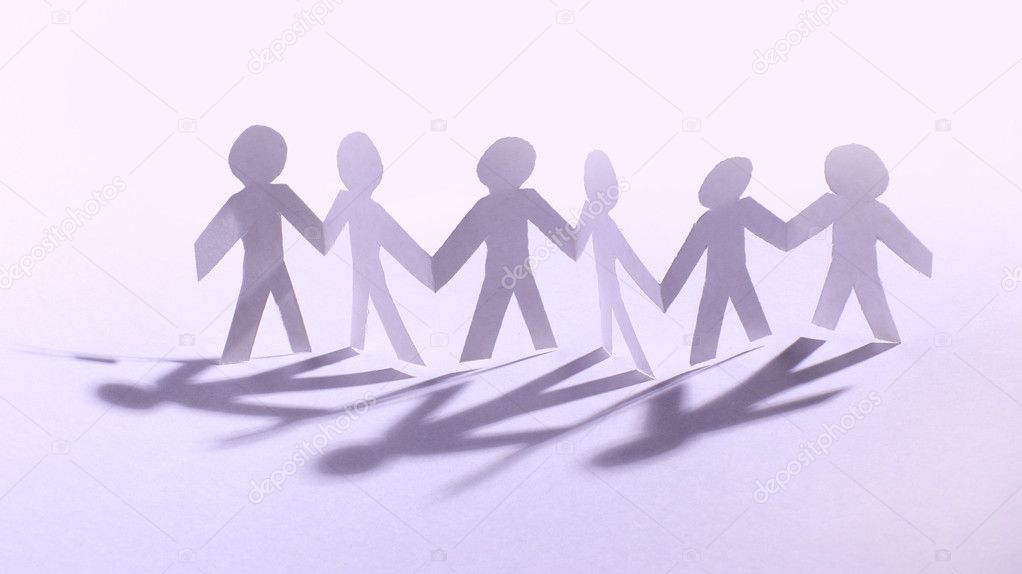 Team of paper doll holding hands