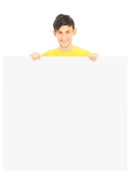 Retrato de un joven guapo sonriente con pancarta en blanco —  Fotos de Stock