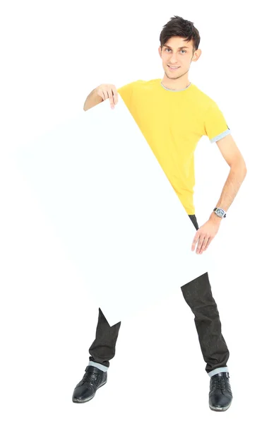 Portrait of a smiling young handsome man with blank banner — Stock Photo, Image